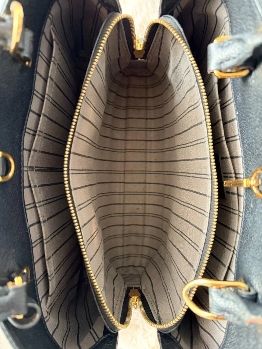 Louis Vuitton Montaigne Handbag | LV Monogram Empreinte Leather MM
